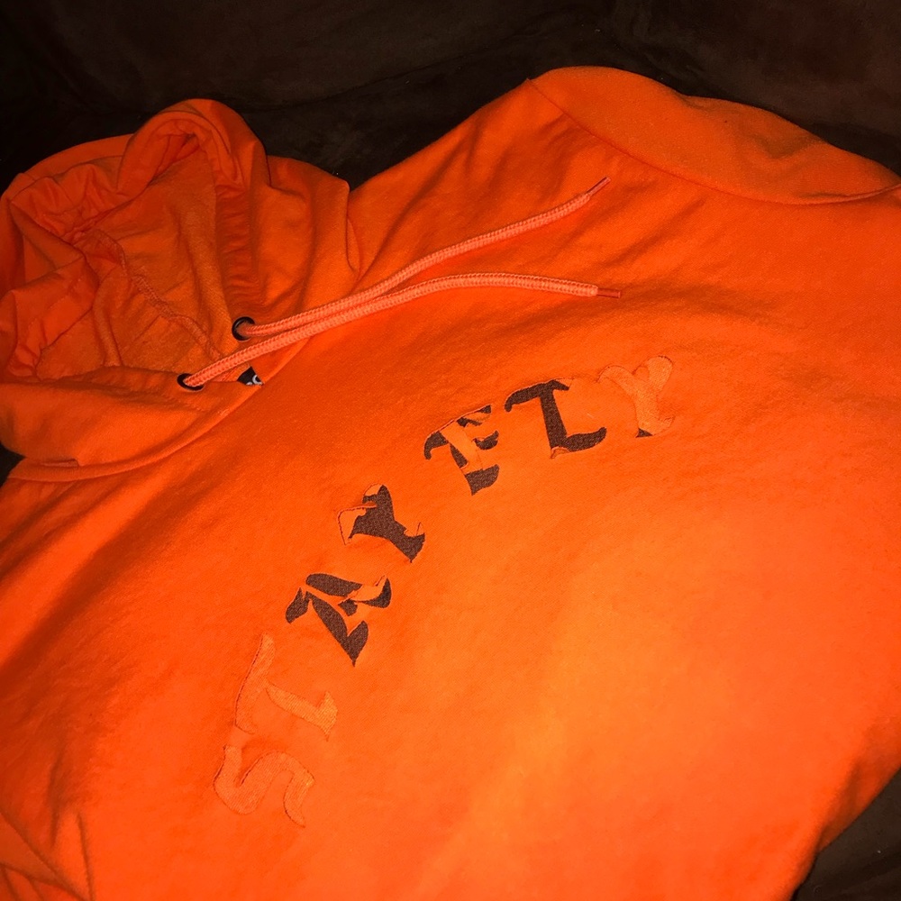 “Stay fly all day” orange hoodie